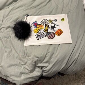 White Patchwork Pouch with Black Pom Pom